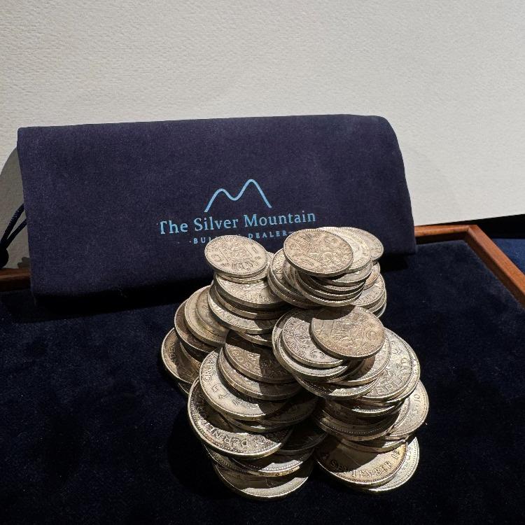 Eén kilo zilver Nederlands muntgeld (brutogewicht 1,389 kg)